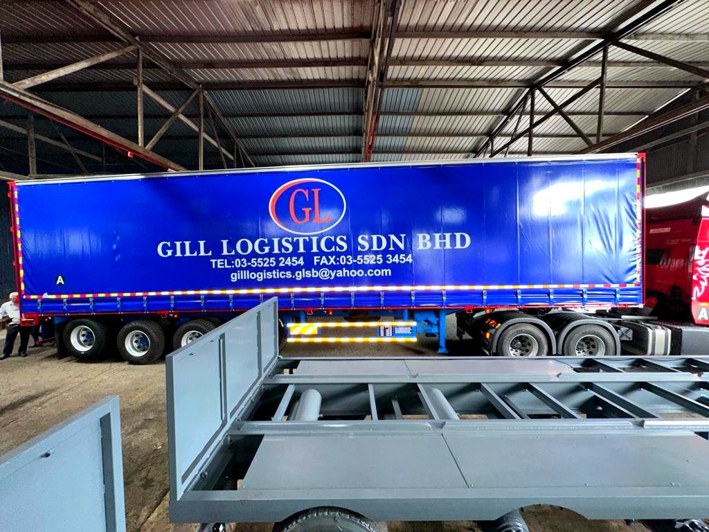 GLSB blue curtain-sider trailer in the warehouse